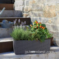 プラスチック製の育てられた庭のベッドの植木鉢の植木鉢